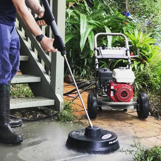 Pressure washing paving with a surface cleaner