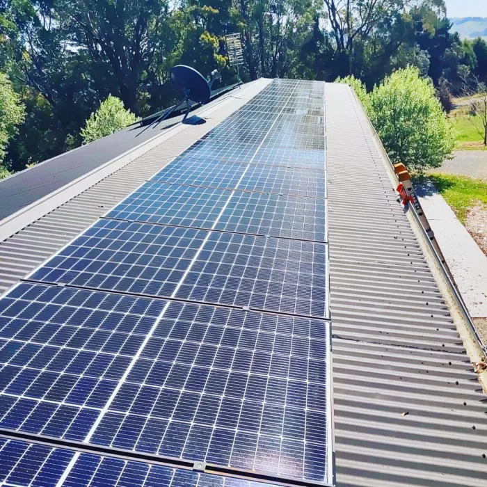 Row of clean solar panels on a roof